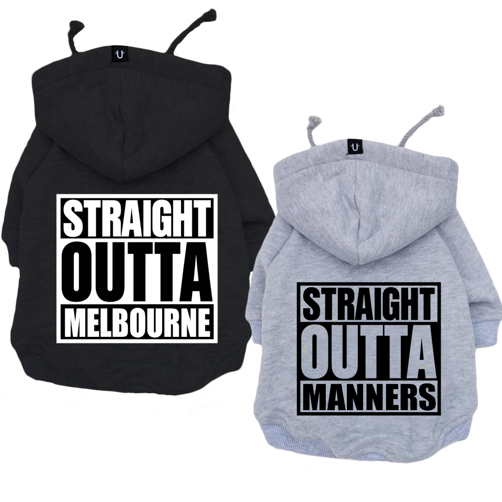 Two pet hoodies shown from the back on a white background, one black and one light heather gray, each with a novelty slogan printed in bold black and white text.