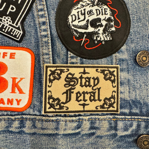 Stay feral embroidered patch in gothic font