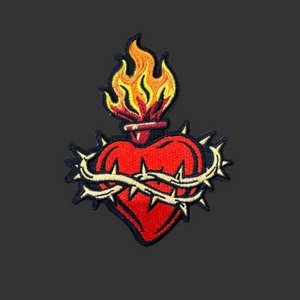 Heart wrapped in barbwire embroidered patch. 