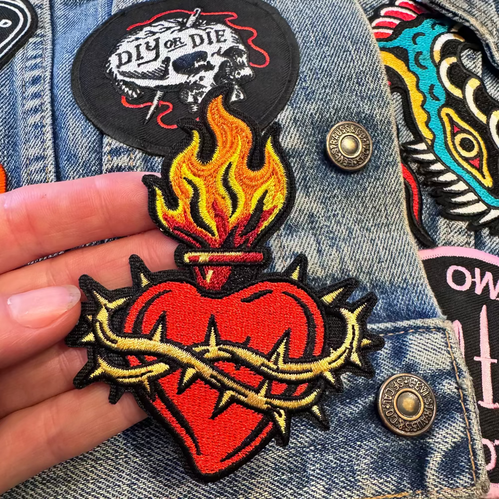 embroidered burning heart patch with barbwire